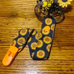 Sunflower pacifier clip
